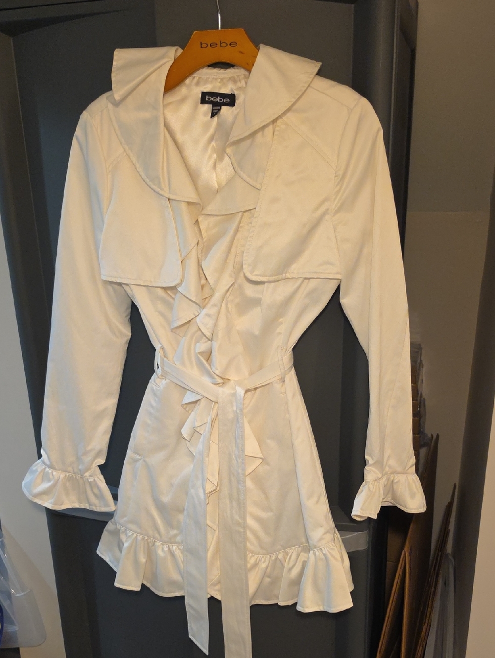 bebe Ivory Ruffle Belted Trench Jacket